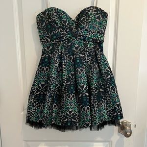 BCBG strapless dress w black tulle underlay. Gray/green floral pattern. Size 2
